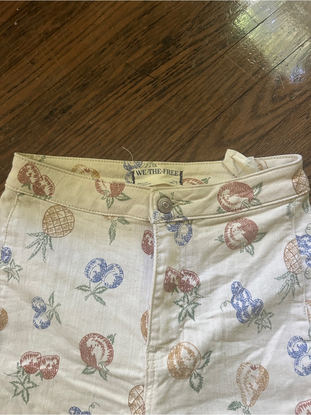 We The Free Cream Denim Bell Bottoms with Multicolor Fruit Print